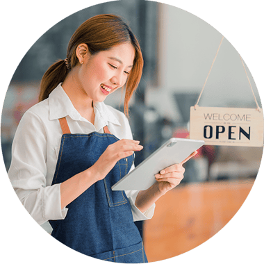 Cutout photo of a waitress looking at a tablet. 